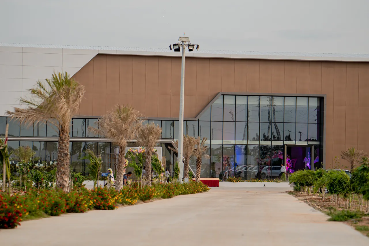 Landscaped driveway approaching the main entrance of Nidhee Convention Centre